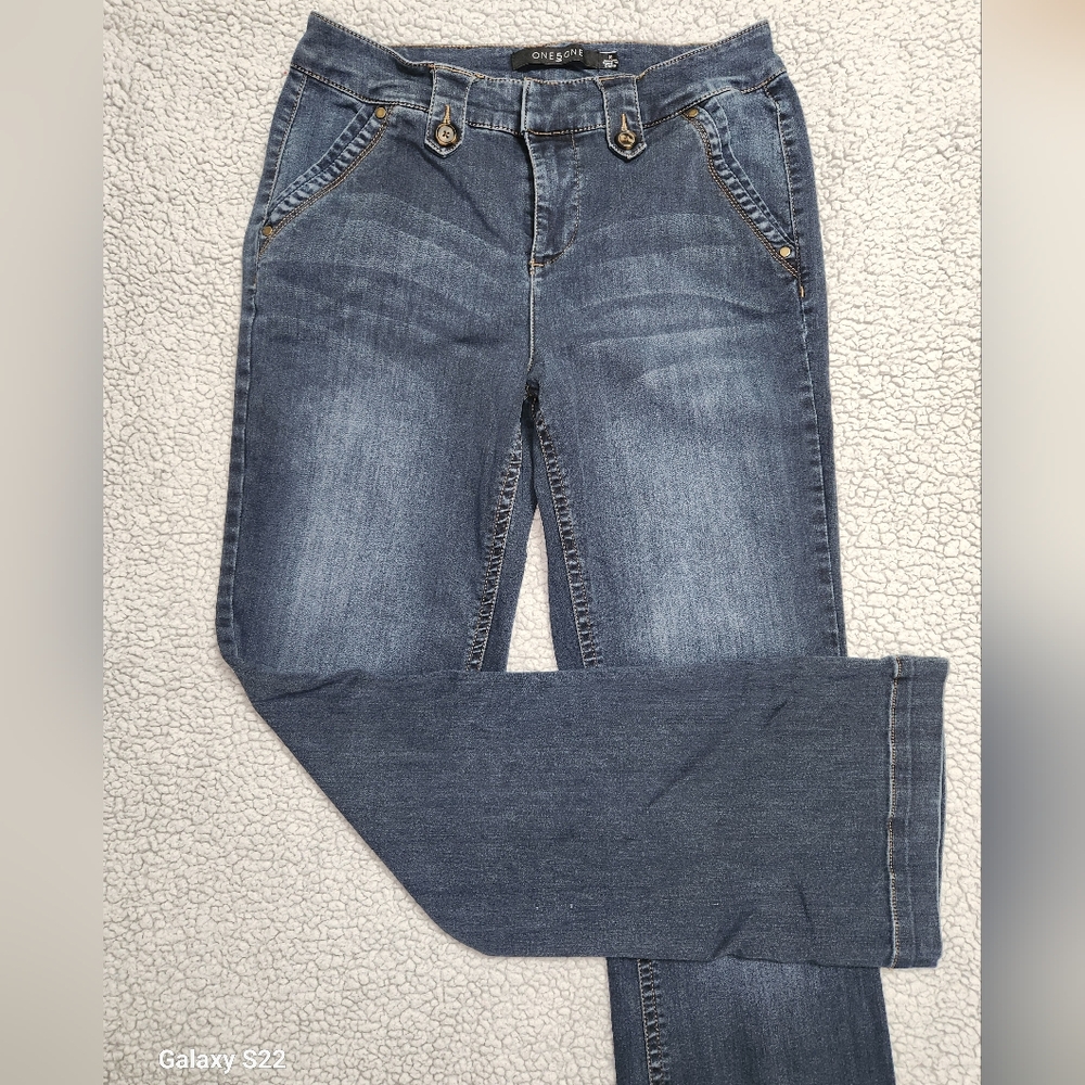 Blue Boot Cut Jeans with Subtle Fading